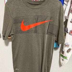 Nike Men's Green T-Shirt with Red Swoosh